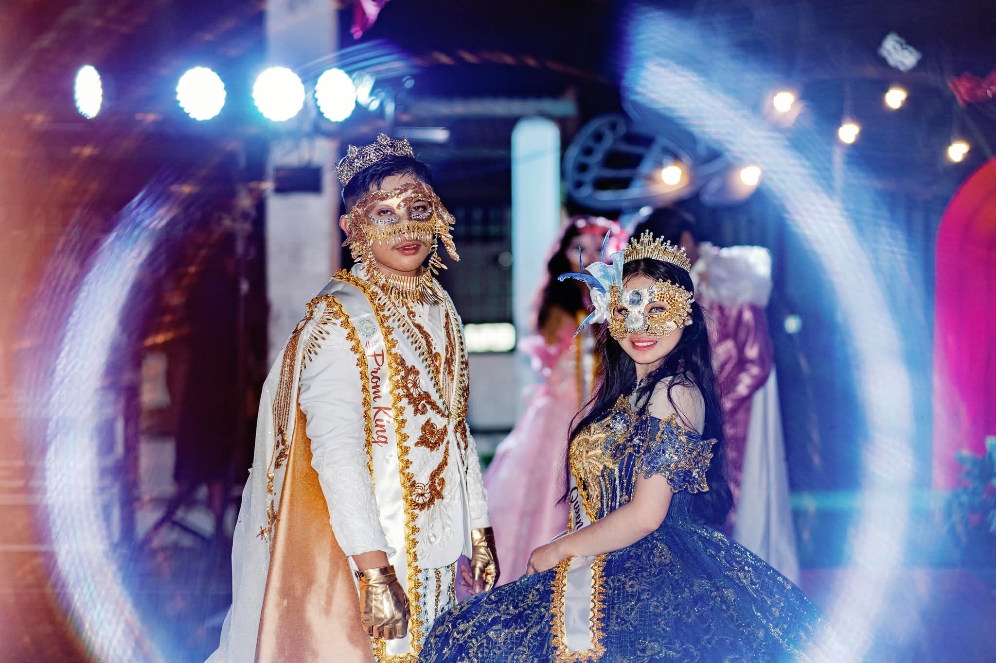 Guardians crowned Prom King and Queen in masquerade finery.